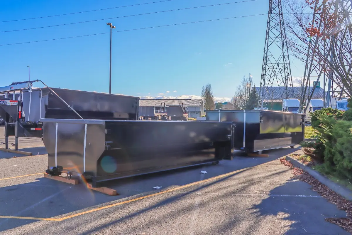 Roll-off dumpster ready for waste disposal at job site for 10 Yard Dumpster Rental in Booneville